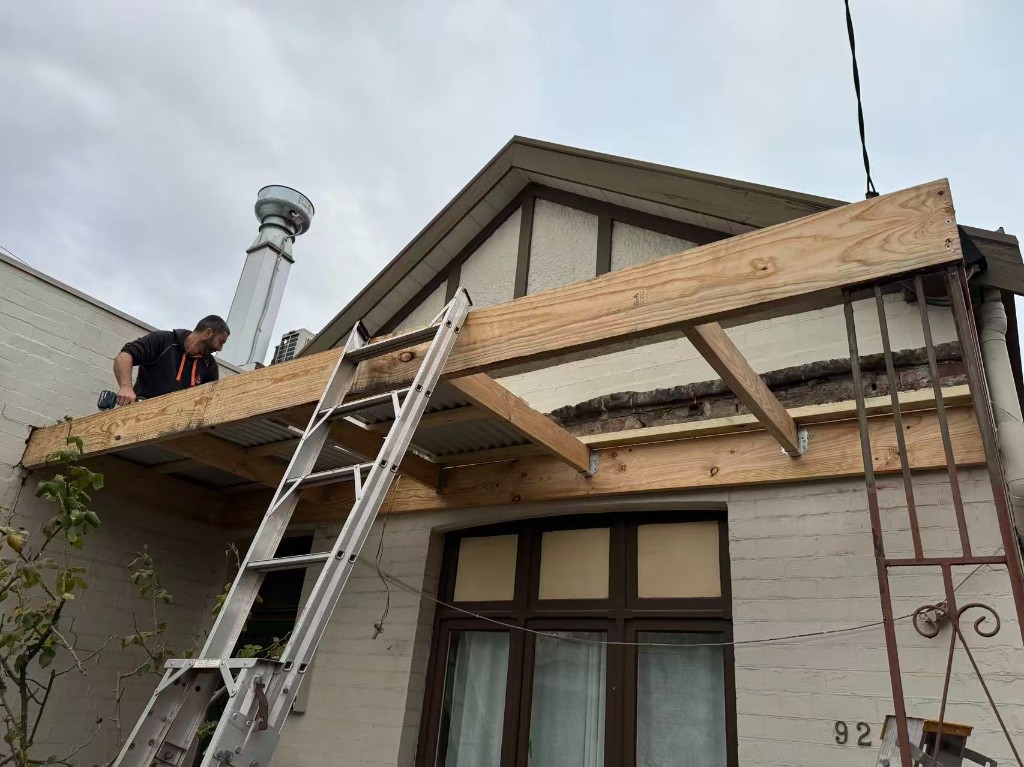 Completed verandah with refreshed facade and green feature trim