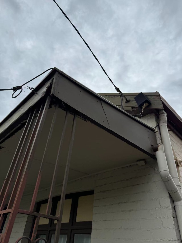 Old rusted roofing sheet condition before replacement
