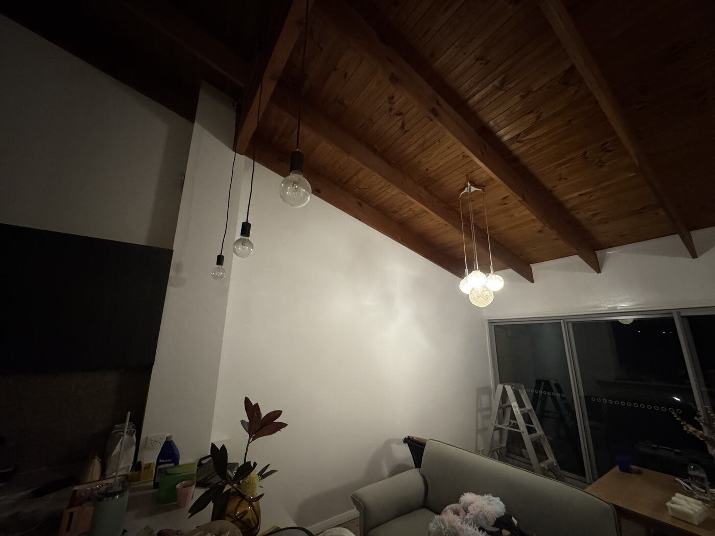 Living area walls prepped and repainted, work underway in the evening