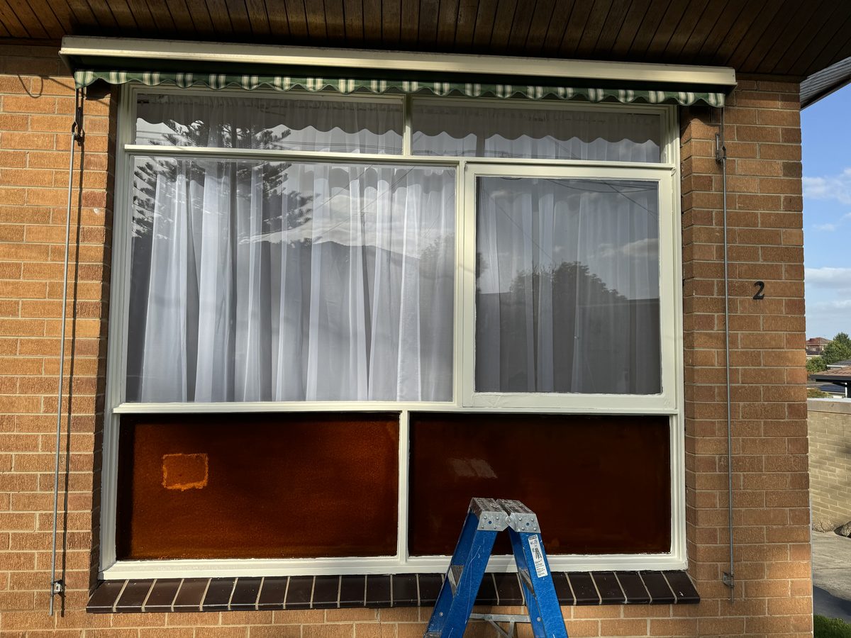 Front window frame being repainted