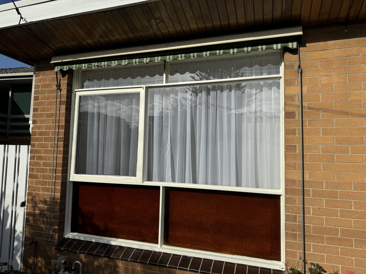 Front window frame repainted, close up