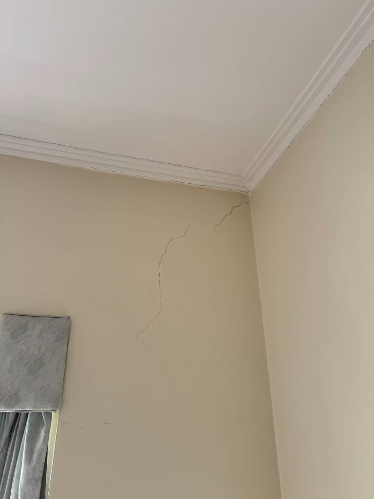 Doorway and wall cracking prior to repairs and repaint