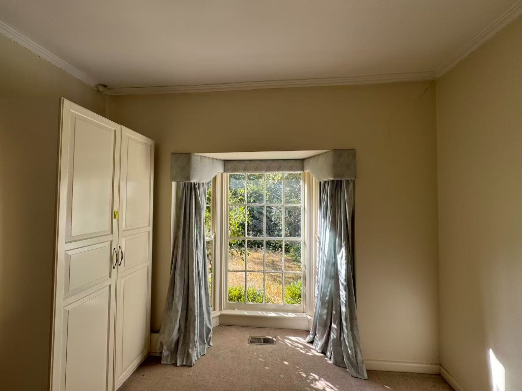 Window area prior to repaint and restoration