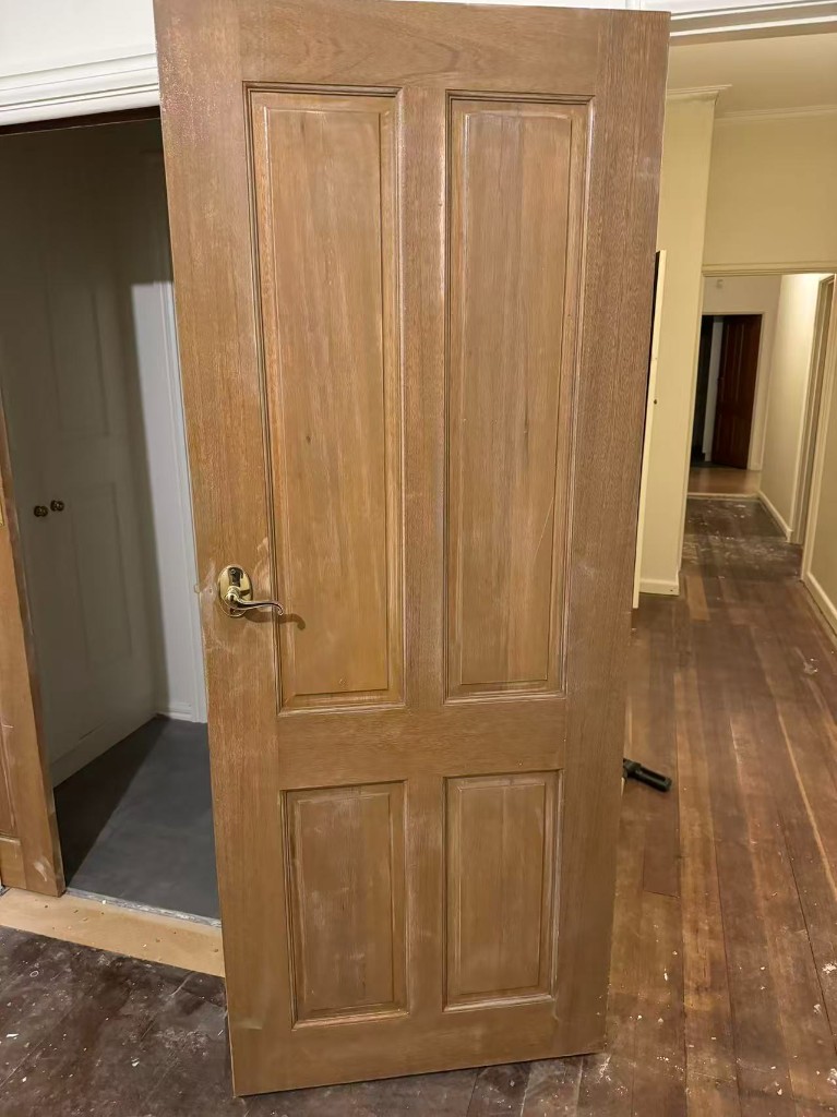 Completed internal room repaint with clean white finishes