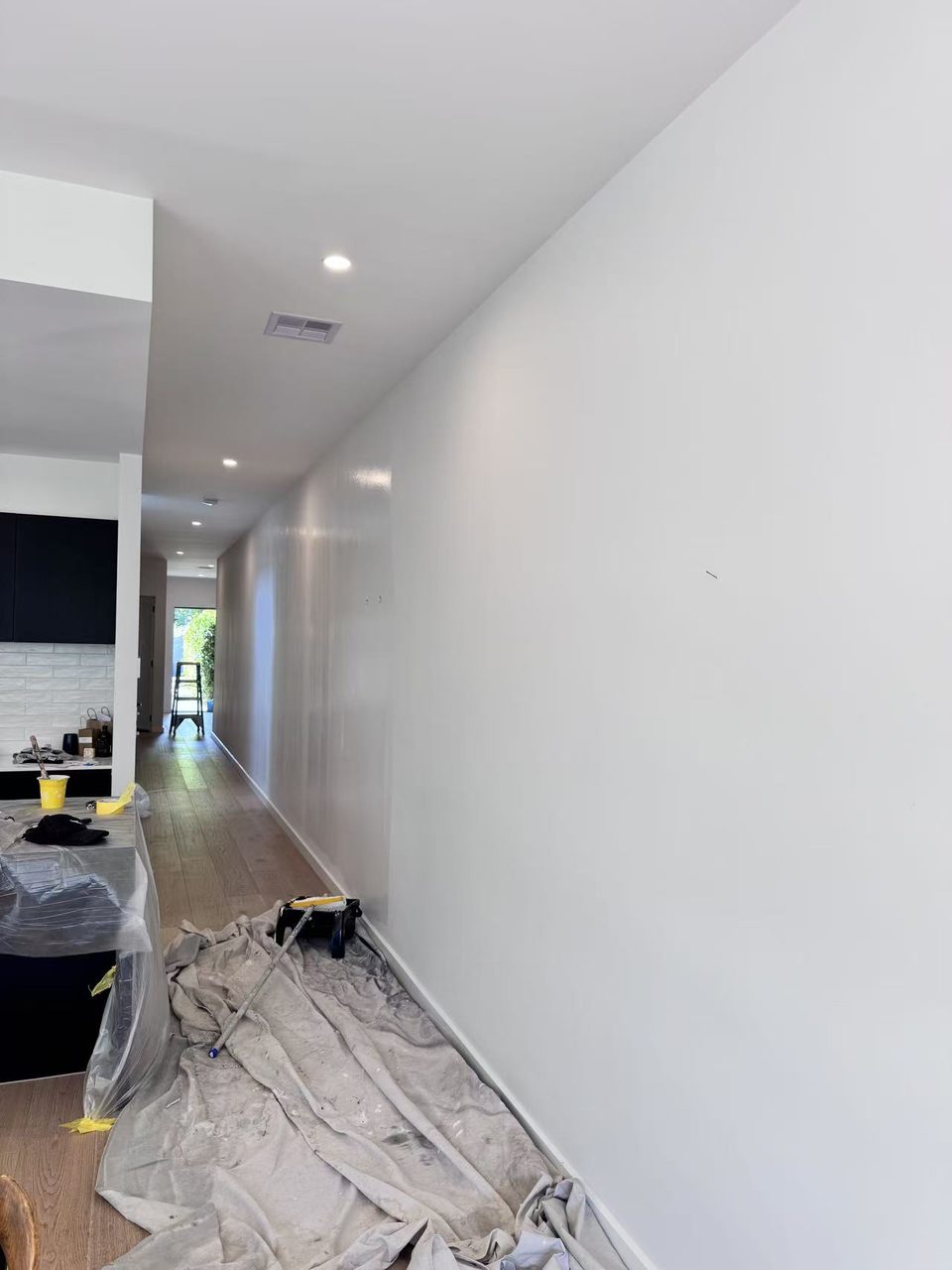 Caulfield pre-auction paint touch-ups — freshly finished hallway feature wall with clean, even coverage