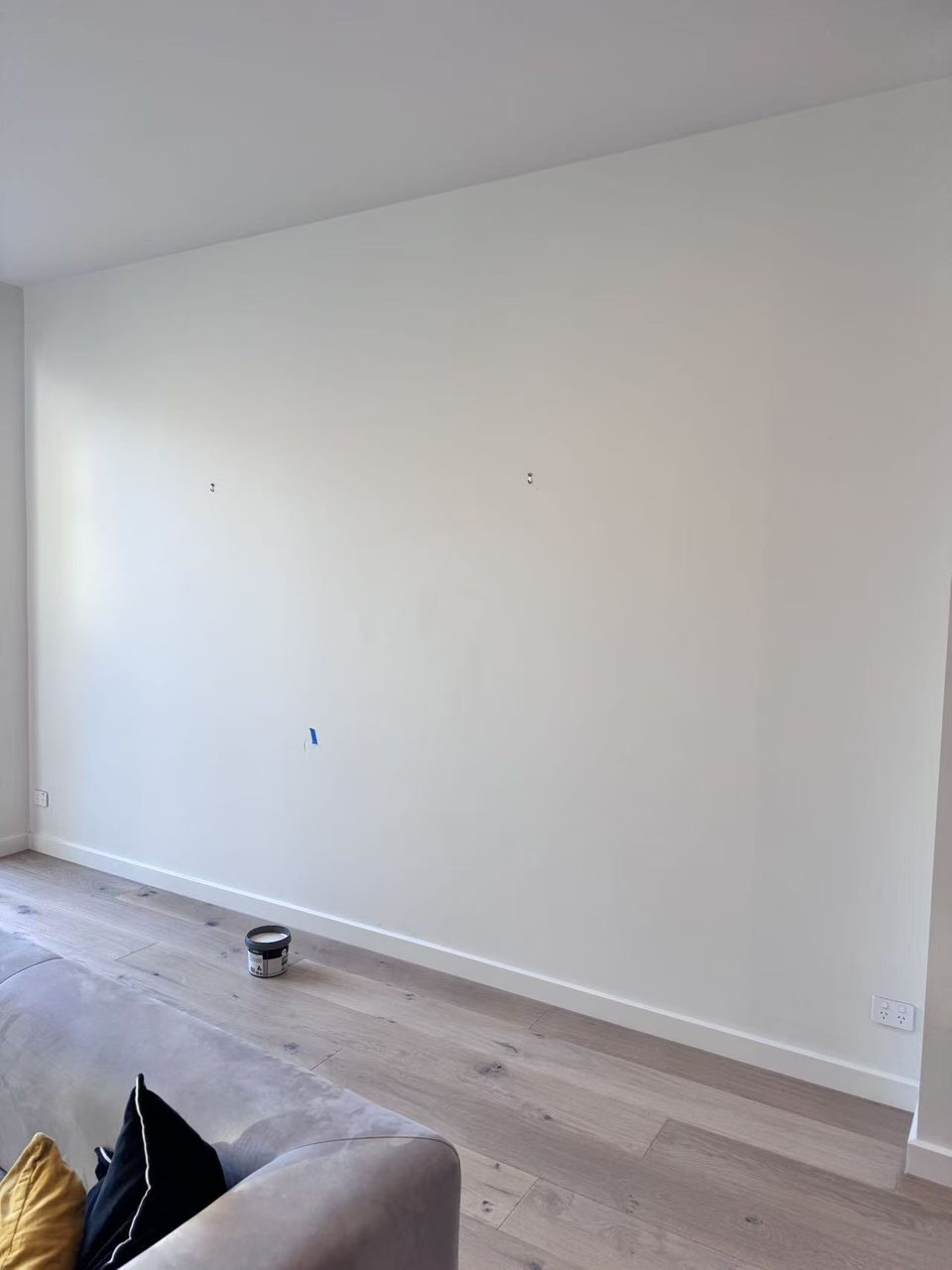 Caulfield pre-auction paint touch-ups — finished living-room wall with a smooth, even finish