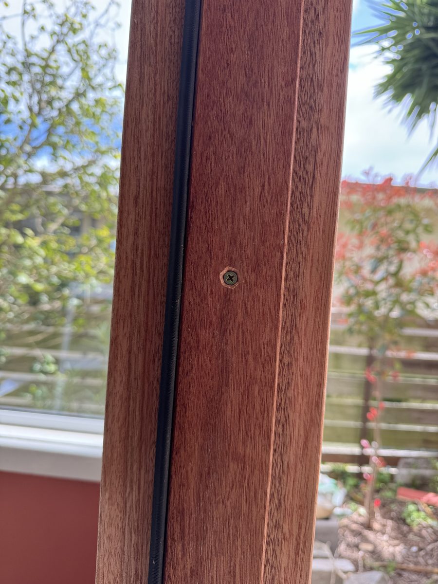 Installing the hinges on the new front door